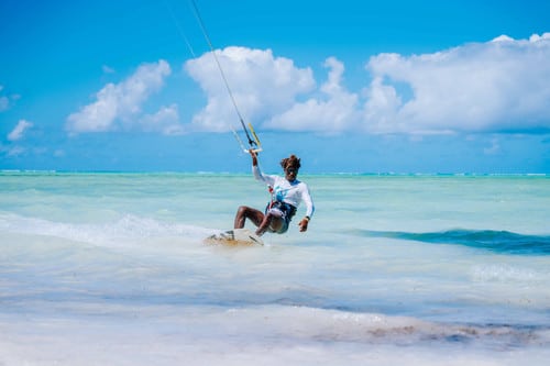 Kitesurfer riding the wind off Shela Beach in Lamu